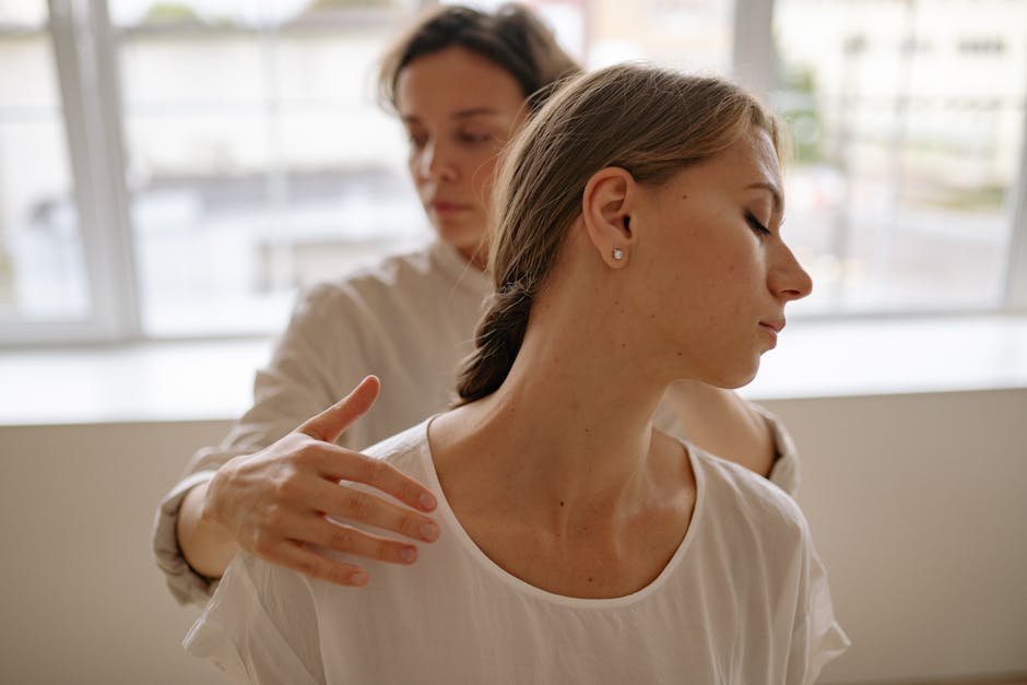 hands demonstrating gentle circular eye massage movements